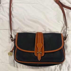 Dooney and Bourke brown and black leather flap crossbody bag